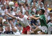 3 August 2003; Brian McGuigan, Tyrone, in action against Fermanagh's Michael Lilley. Bank of Ireland All-Ireland Senior Football Championship Quarter Final, Tyrone v Fermanagh, Croke Park, Dublin. Picture credit; Brendan Moran / SPORTSFILE *EDI*