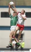 3 August 2003; Paul Brewster, Fermanagh, in action against Tyrone's Kevin Hughes. Bank of Ireland All-Ireland Senior Football Championship Quarter Final, Tyrone v Fermanagh, Croke Park, Dublin. Picture credit; Brendan Moran / SPORTSFILE *EDI*