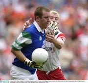 3 August 2003; Ronan Gallagher, Fermanagh, in action against Tyrone's Owen Mulligan. Bank of Ireland All-Ireland Senior Football Championship Quarter Final, Tyrone v Fermanagh, Croke Park, Dublin. Picture credit; Brendan Moran / SPORTSFILE *EDI*