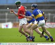31 July 2003; Brian Murphy of Cork in action against Eoin Kelly of Tipperary during the Erin Munster Under 21 Hurling Final between Tipperary and Cork at Semple Stadium in Thurles, Co. Tipperary. Photo by Damien Eagers/Sportsfile