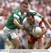 3 August 2003; Brian Dooher of Tyrone in action against Neil Cox of Fermanagh during the Bank of Ireland All-Ireland Senior Football Championship Quarter Final between Tyrone and Fermanagh at Croke Park in Dublin. Photo by Damien Eagers/Sportsfile