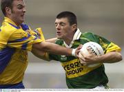 4 August 2003; Aodan MacGearailt of Kerry in action against Brian Higgins of Roscommon during the Bank of Ireland All-Ireland Senior Football Championship Quarter Final between Kerry and Roscommon at Croke Park in Dublin. Photo by Ray McManus/Sportsfile