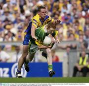 4 August 2003; Colm Cooperof Kerry in action against Paul Noone of Roscommon during the Bank of Ireland All-Ireland Senior Football Championship Quarter Final between Kerry and Roscommon at Croke Park in Dublin. Photo by Brendan Moran/Sportsfile