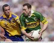4 August 2003; Seamus Moynihan of Kerry in action against Derek Connellan of Roscommon during the Bank of Ireland All-Ireland Senior Football Championship Quarter Final between Kerry and Roscommon at Croke Park in Dublin. Photo by Brendan Moran/Sportsfile