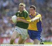 4 August 2003; Tomas O'Sé of Kerry in action against Derek Connellan of Roscommon during the Bank of Ireland All-Ireland Senior Football Championship Quarter Final match between Kerry and Roscommon at Croke Park in Dublin. Photo by Ray McManus/Sportsfile
