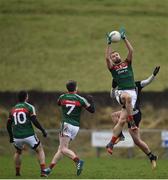 21 January 2018; Jason Gibbons of Mayo in action against Patrick O’Connor of Sligo during the Connacht FBD League Round 5 match between Sligo and Mayo at James Stephen's Park in Ballina, Co Mayo. Photo by Seb Daly/Sportsfile