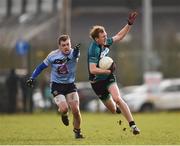 23 January 2018; Paul Cribben of Maynooth University in action against Eoin Lowry of University College Dublin during the Electric Ireland HE GAA Sigerson Cup Round 1 match between Maynooth University and University College Dublin at Maynooth University North Campus in Maynooth, Kildare. Photo by Seb Daly/Sportsfile