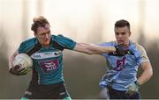 23 January 2018; Paul Cribben of Maynooth University in action against Eoin Murchan of University College Dublin during the Electric Ireland HE GAA Sigerson Cup Round 1 match between Maynooth University and University College Dublin at Maynooth University North Campus in Maynooth, Kildare. Photo by Seb Daly/Sportsfile