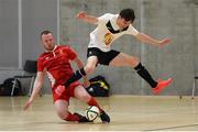 24 January 2018; Stephen Quinn of IT Carlow in action against Sean Higgins of UCC during the CUFL Men’s Futsal Finals at Waterford IT Arena in Waterford. Photo by Diarmuid Greene/Sportsfile