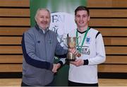 24 January 2018; DIT captain Jamie Broderick is presented with the cup by CUFL Chairman Joe O'Brien after the CUFL Men’s Futsal Finals at Waterford IT Arena in Waterford. Photo by Diarmuid Greene/Sportsfile