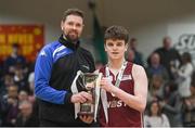 24 January 2018; Paul Kelly of St Pauls Oughterard is presented with the cup by Templeogue and Ireland basketball player Jason Killeen after the Subway All-Ireland Schools U19B Boys Cup Final match between St Pauls Oughterard and St Vincents Castleknock College at the National Basketball Arena in Tallaght, Dublin. Photo by Eóin Noonan/Sportsfile