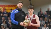 24 January 2018; Paul Kelly of St Pauls Oughterard is presented with the MVP award by Templeogue and Ireland basketball player Jason Killeen after the Subway All-Ireland Schools U19B Boys Cup Final match between St Pauls Oughterard and St Vincents Castleknock College at the National Basketball Arena in Tallaght, Dublin. Photo by Eóin Noonan/Sportsfile