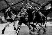 24 January 2018; (EDITOR'S NOTE: Image has been converted to black & white) Cian Monaghan of St Pauls Oughterard in action against David Nugent of St Vincents, centre, Jack Hensey, left, and Ronan Barrett of Castleknock College during the Subway All-Ireland Schools U19B Boys Cup Final match between St Pauls Oughterard and St Vincents Castleknock College at the National Basketball Arena in Tallaght, Dublin. Photo by Eóin Noonan/Sportsfile