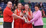 25 January 2018; Scoil Chriost Rí co-captains Jasmine Burke, 2nd left, and Sarah Fleming are presented with the cup by PJ Reidy, left, Basketball Ireland Post Primary Schools Executive and Basketball Ireland President Theresa Walsh after the Subway All-Ireland Schools U16A Girls Cup Final match between Crescent Comprehensive, Limerick, and Scoil Chriost Rí, Portlaoise, Laois, at the National Basketball Arena in Tallaght, Dublin. Photo by Brendan Moran/Sportsfile