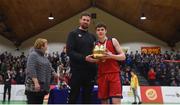 23 January 2018; Matthew Harper of Templeogue Collegel is presented with the MVP award by Templeogue and Ireland basketballer Jason Killeen following the Subway All-Ireland Schools U19A Boys Cup Final match between St Malachy's Belfast and Templeogue College at the National Basketball Arena in Tallaght, Dublin. Photo by David Fitzgerald/Sportsfile