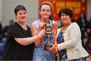 26 January 2018; DCU Mercy capyain Aoife Maguire is presented with the cup by Orla Rooney, left, NABC Member, and President of Basketball Ireland Theresa Walsh after the Hula Hoops Under 20 Women’s National Cup Final match between Brunell and DCU Mercy at the National Basketball Arena in Tallaght, Dublin. Photo by Brendan Moran/Sportsfile