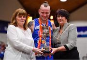 27 January 2018; Blue Demons captain Stuart Rodgers is presented with the cup by Margaret Miley, left, NABC Member, and President of Basketball Ireland Theresa Walsh after the Hula Hoops NICC Men’s National Cup Final match between Blue Demons and BC Leixlip Zalgiris at the National Basketball Arena in Tallaght, Dublin. Photo by Brendan Moran/Sportsfile