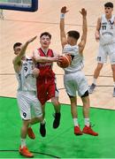 27 January 2018; Iarla McKeon of Templeogue in action against David Murray, left and Jake Collins of Neptune during the Hula Hoops Under 18 Men’s National Cup Final match between Neptune and Templeogue at the National Basketball Arena in Tallaght, Dublin. Photo by Eóin Noonan/Sportsfile