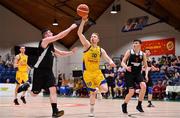 27 January 2018; Ian McLoughlin of Keane's Supervalu Killorglin in action against Ciaran O'Sullivan, left, and Dylan Corkery of Ballincollig during the Hula Hoops President’s Cup Final match between Ballincollig and Keane’s SuperValu Killorglin at the National Basketball Arena in Tallaght, Dublin. Photo by Brendan Moran/Sportsfile