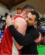 27 January 2018; Jason Killeen of Black Amber Templeogue and UCD Marian head coach Ioannis Liapakis after the Hula Hoops Pat Duffy National Cup Final match between UCD Marian and Black Amber Templeogue at the National Basketball Arena in Tallaght, Dublin. Photo by Eóin Noonan/Sportsfile