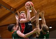 28 January 2018; Eoin McCann of Kubs in action against Paul Kelly, left, and Max Brennan of Moycullen during the Hula Hoops Under 20 Men’s National Cup Final match between Moycullen and KUBS at the National Basketball Arena in Tallaght, Dublin. Photo by Brendan Moran/Sportsfile