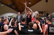 28 January 2018; Stephen Allen of Kubs lifts the cup after the Hula Hoops Under 20 Men’s National Cup Final match between Moycullen and KUBS at the National Basketball Arena in Tallaght, Dublin. Photo by Eóin Noonan/Sportsfile