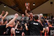 28 January 2018; Stephen Allen of Kubs lifts the cup after the Hula Hoops Under 20 Men’s National Cup Final match between Moycullen and KUBS at the National Basketball Arena in Tallaght, Dublin. Photo by Eóin Noonan/Sportsfile