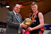 28 January 2018; Eoin McCann of Kubs is presented with the MVP by General Secretary of Basketball Ireland Bernard O'Byrne after the Hula Hoops Under 20 Men’s National Cup Final match between Moycullen and KUBS at the National Basketball Arena in Tallaght, Dublin. Photo by Brendan Moran/Sportsfile