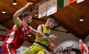 27 January 2018; Neil Baynes of UCD Marian is blocked by Jason Killeen of Black Amber Templeogue during the Hula Hoops Pat Duffy National Cup Final match between UCD Marian and Black Amber Templeogue at the National Basketball Arena in Tallaght, Dublin. Photo by Brendan Moran/Sportsfile