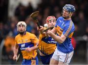 28 January 2018; Tomás Hamill of Tipperary in action against Peter Duggan of Clare during the Allianz Hurling League Division 1A Round 1 match between Clare and Tipperary at Cusack Park in Ennis, County Clare.  Photo by Stephen McCarthy/Sportsfile