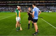 27 January 2018; Referee Paud O'Dwyer performs the coin toss with team captains David King of Offaly and Chris Crummy of Dublin before the Allianz Hurling League Division 1B Round 1 match between Dublin and Offaly at Croke Park in Dublin. Photo by Piaras Ó Mídheach/Sportsfile