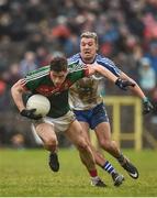 28 January 2018; Neil Douglas of Mayo in action against Ryan Wylie of Monaghan during the Allianz Football League Division 1 Round 1 match between Monaghan and Mayo at St Tiernach's Park in Clones, County Monaghan. Photo by Seb Daly/Sportsfile