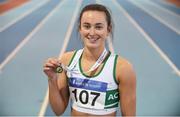 28 January 2018; Ciara Neville of Emerald AC, Co Limerick, with her gold medal after winning the Junior Women 60m during the Irish Life Health National Indoor Junior and U23 Championships at Athlone IT in Athlone, County Westmeath. Photo by Sam Barnes/Sportsfile