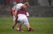 28 January 2018; Peter Cooke of Galway and Hugh Pat McGeary of Tyrone tussle during the Allianz Football League Division 1 Round 1 match between Galway and Tyrone at St Jarlath's Park in Tuam, County Galway.  Photo by Piaras Ó Mídheach/Sportsfile