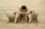 28 January 2018; Ben Browne Roche of Slí Cualann, Co Wicklow, competing in the U23 Men Long Jump during the Irish Life Health National Indoor Junior and U23 Championships at Athlone IT in Athlone, County Westmeath. Photo by Sam Barnes/Sportsfile