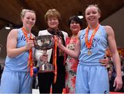 28 January 2018; DCU Mercy co-capyains Aisling Sullivan, left, and Sarah Woods are presented with the cup by Annette O'Toole, 2nd left, WNLC Member, and President of Basketball Ireland Theresa Walsh after the Hula Hoops Women’s National Cup Final match between DCU Mercy and Ambassador UCC Glanmire at the National Basketball Arena in Tallaght, Dublin. Photo by Brendan Moran/Sportsfile