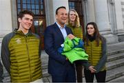 29 January 2018; An Taoiseach, Leo Varadkar congratulated Team Ireland Winter Olympic athletes ahead of their departure for the Pyeongchang Winter Olympics. The Olympic Council of Ireland (OCI) confirmed that five Irish athletes have qualified to represent Team Ireland at the 2018 Winter Olympic Games in PyeongChang, South Korea, from the 9th – 25th February. Team Ireland, who were gathered in Dublin today for a workshop, held jointly by the OCI and Sport Ireland were met by An Taoiseach Leo Varadkar who congratulated them on the achievement of being selected to represent Ireland at the Olympic Games and presented them with their official Team Ireland kit. Pictured is An Taoiseach Leo Varadkar with athletes, from left, Seamus O'Connor, Brendan Newby and Tess Arbez. Photo by Ramsey Cardy/Sportsfile