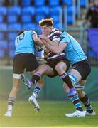 29 January 2018; Jamie Devlin of Terenure College is tackled by Jay Barron, left, and Ryan Baird of St Michael's College during the Bank of Ireland Leinster Schools Senior Cup Round 1 match between Terenure College and St Michael's College at Donnybrook Stadium, in Dublin.  Photo by Darragh McCrohan/Sportsfile