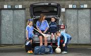 30 January 2018; Dublin camogie player Eimear McCarthy, with young Dubs, from left, Kyah O'Reilly, age 8, Dara Ryan, age 7 and Christian Kelly, age 7, in Parnell Park to kick off the 2018 Dublin GAA Season with team sponsor’s AIG Insurance. To celebrate the new year, AIG revealed details of their latest car insurance deal, offering 20% off car insurance to new customers. For more info call 1890 50 27 27 or log on to www.aig.ie/dubs. Parnell Park, Dublin. Photo by David Fitzgerald/Sportsfile