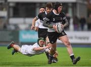 31 January 2018; Larry Kelly of Newbridge College evades the tackle of Christopher Williams of Presentation College Bray during the Bank of Ireland Leinster Schools Senior Cup Round 1 match between Newbridge College and Presentation College Bray at Donnybrook Stadium in Dublin. Photo by Seb Daly/Sportsfile