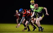 1 February 2018; Conor O'Carroll of Trinity College gets past John Fitzpatrick, centre, and Michael Redmond of IT Carlow during the Electric Ireland HE GAA Fitzgibbon Cup Group D Round 3 match between Trinity College Dublin and IT Carlow at Trinity Sports Grounds, Santry Avenue, in Dublin. Photo by Piaras Ó Mídheach/Sportsfile