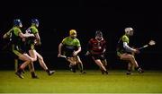 1 February 2018; John Walsh of Trinity College takes on IT Carlow players, from left, Shane Reck, Shane Phelan, Dwane Palmer and James Doyle during the Electric Ireland HE GAA Fitzgibbon Cup Group D Round 3 match between Trinity College Dublin and IT Carlow at Trinity Sports Grounds, Santry Avenue, in Dublin. Photo by Piaras Ó Mídheach/Sportsfile
