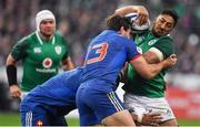 3 February 2018; Bundee Aki of Ireland is tackled by Jefferson Poirot, left, and Remi Lamerat of France during the NatWest Six Nations Rugby Championship match between France and Ireland at the Stade de France in Paris, France. Photo by Brendan Moran/Sportsfile