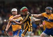4 February 2018; Pat Lyng of Kilkenny scores a point while under pressure from David McInerney of Clare during the Allianz Hurling League Division 1A Round 2 match between Kilkenny and Clare at Nowlan Park, in Kilkenny. Photo by Seb Daly/Sportsfile