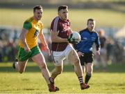 4 February 2018; Damien Comer of Galway in action against Leo McLoone of Donegal during the Allianz Football League Division 1 Round 2 match between Donegal and Galway at O'Donnell Park, in Letterkenny, Donegal. Photo by Oliver McVeigh/Sportsfile