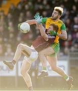 4 February 2018; Adrian Varley of Galway in action against Stephen McMenamin of Donegal during the Allianz Football League Division 1 Round 2 match between Donegal and Galway at O'Donnell Park, in Letterkenny, Donegal. Photo by Oliver McVeigh/Sportsfile