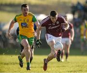 4 February 2018; Damien Comer of Galway in action against Leo McLoone of Donegal during the Allianz Football League Division 1 Round 2 match between Donegal and Galway at O'Donnell Park, in Letterkenny, Donegal. Photo by Oliver McVeigh/Sportsfile