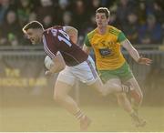 4 February 2018; Damien Comer of Galway in action against Caolan Ward of Donegal during the Allianz Football League Division 1 Round 2 match between Donegal and Galway at O'Donnell Park, in Letterkenny, Donegal. Photo by Oliver McVeigh/Sportsfile