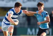 4 February 2018; Ben Brownlee of Blackrock College holds off the tackle of Callum O'Reilly of St Michael's College during the Bank of Ireland Leinster Schools Junior Cup Round 1 match between St Michael’s College and Blackrock College at Donnybrook Stadium, in Dublin. Photo by Brendan Moran/Sportsfile