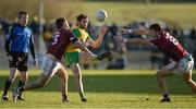 4 February 2018; Odhran MacNiallais of Donegal in action against Patrick Sweeney and Paul Conroy of Galway  during the Allianz Football League Division 1 Round 2 match between Donegal and Galway at O'Donnell Park, in Letterkenny, Donegal. Photo by Oliver McVeigh/Sportsfile